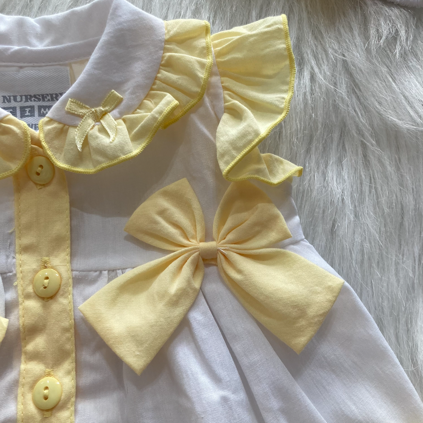 Rock a Bye Baby Meisjesjurk Wit/Geel met Strikjes