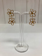 Oorbellen silhouette bloem met steentjes goud