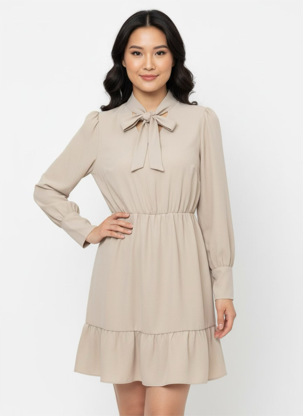 Beige skater dress with ruffle and knot at the neck