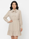 Beige skater dress with ruffle and knot at the neck