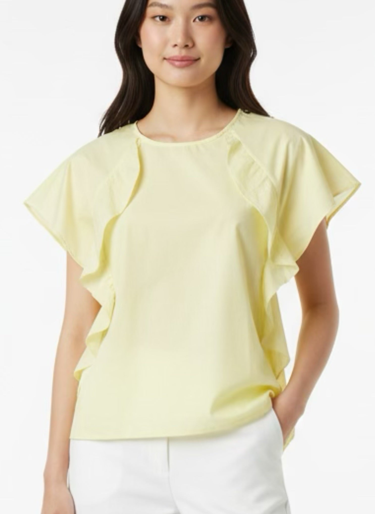 Yellow blouse with ruffle and three buttons on the shoulders