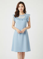 Blue dress with chiffon and lace at bust and collar.