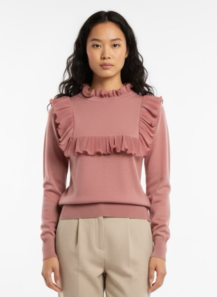 Pink sweater with frill on the front and back