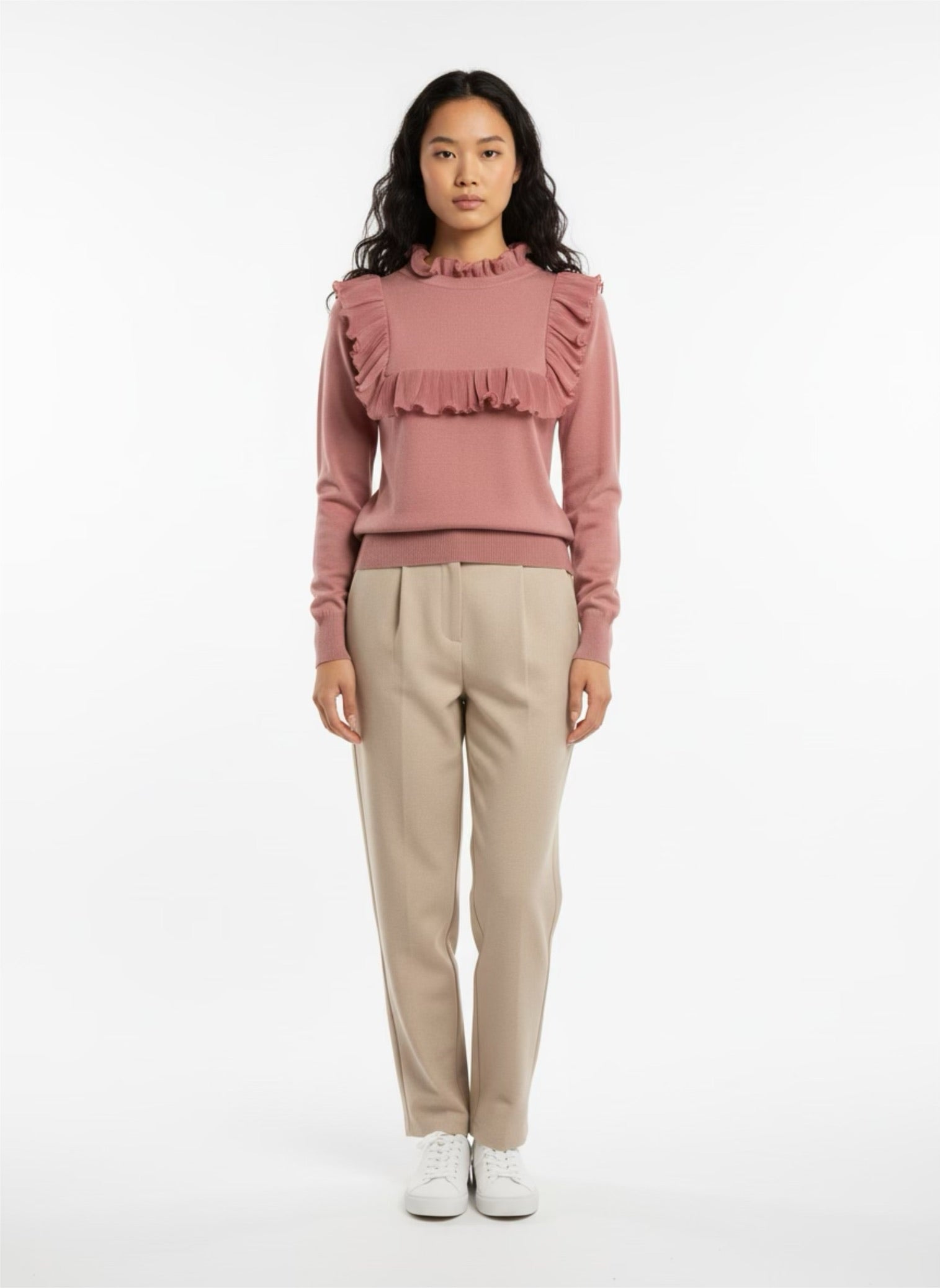 Pink sweater with frill on the front and back