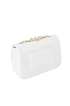 Bag stitching gold and white details