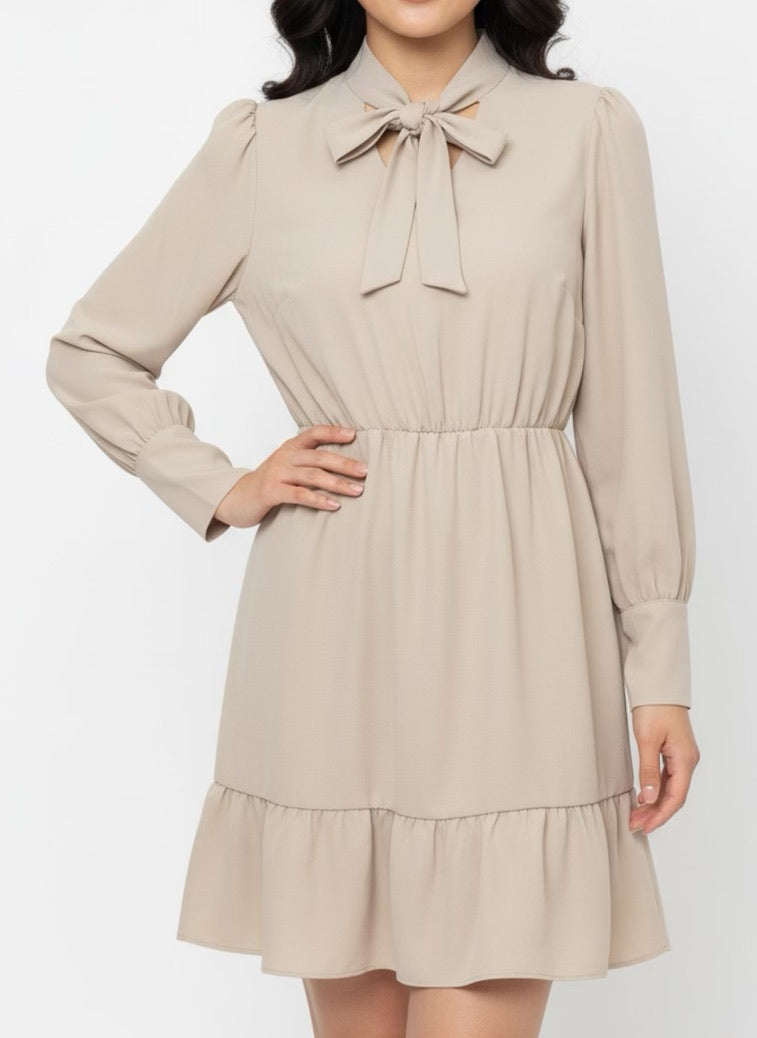 Beige skater dress with ruffle and knot at the neck