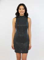 Black cocktail dress with sequins and sleeveless high neck.