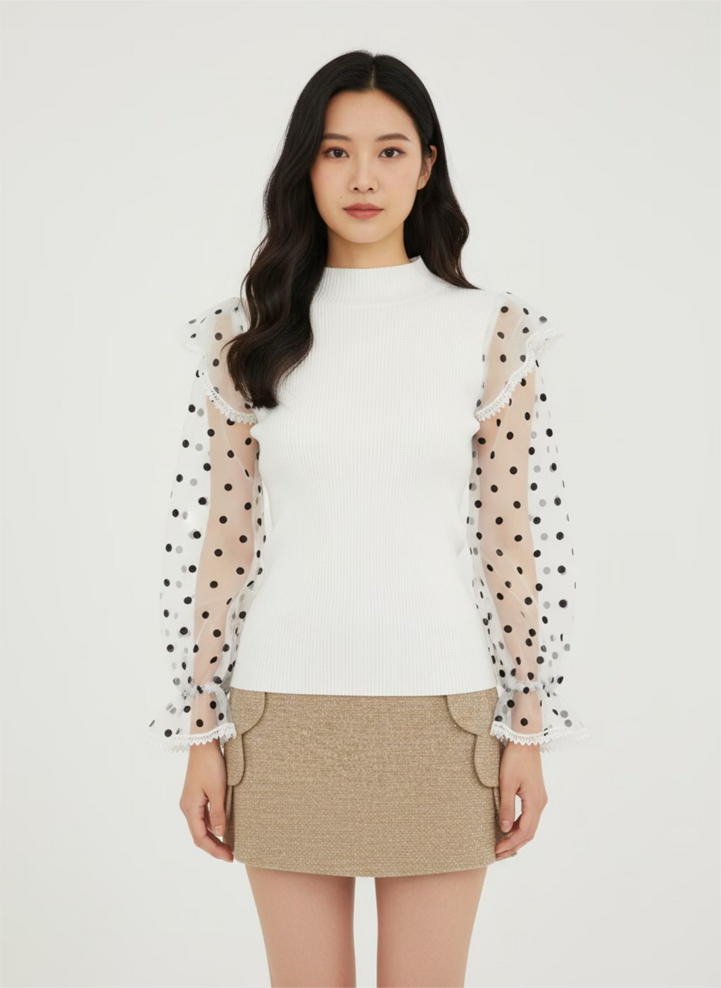 White ribbed sweater with puff sleeves in plumetis tulle