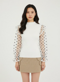 White ribbed sweater with puff sleeves in plumetis tulle