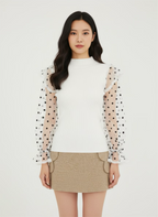 White ribbed sweater with puff sleeves in plumetis tulle