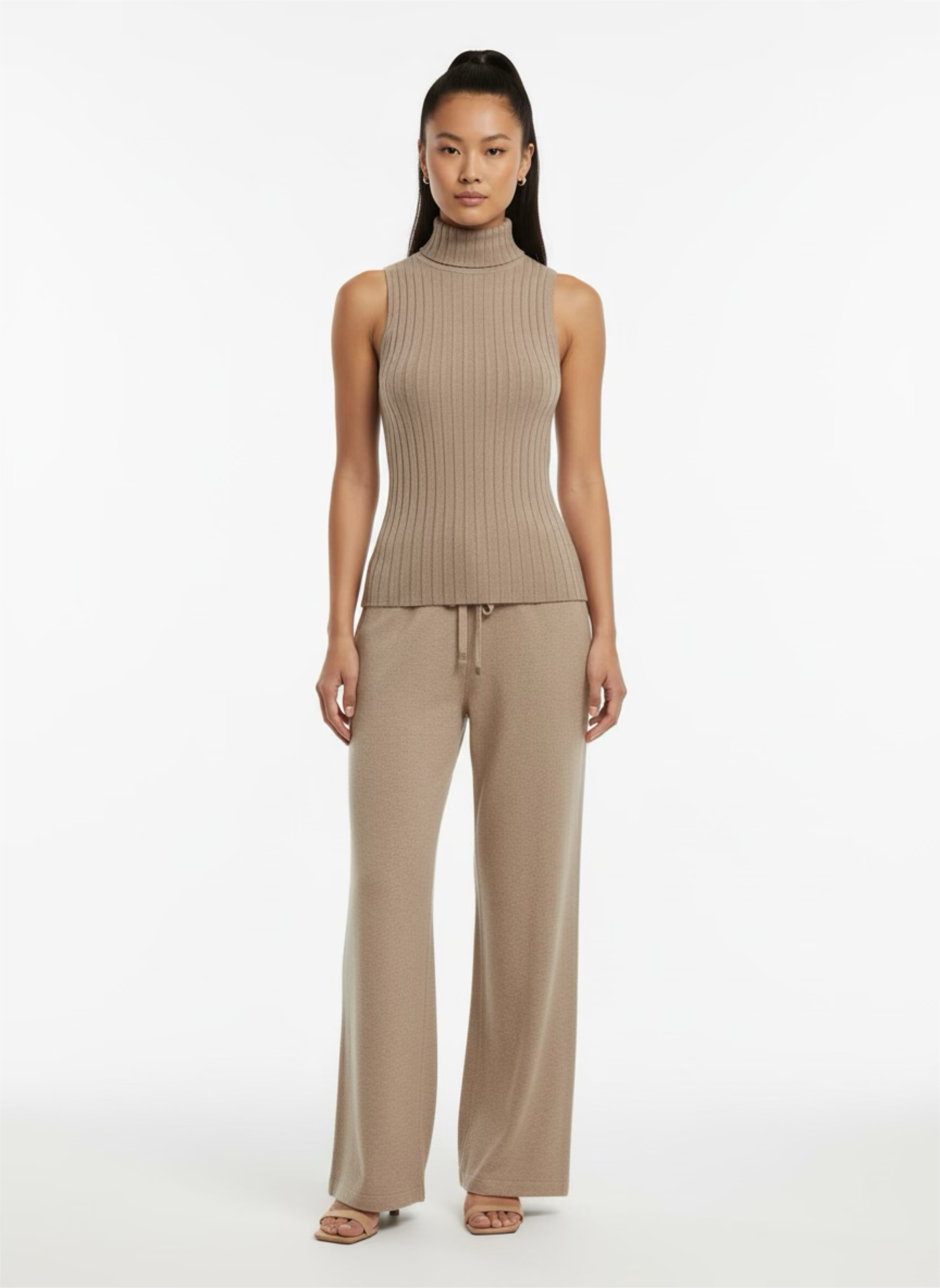 Very stretchy taupe turtle neck sleeveless top