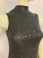 Black cocktail dress with sequins and sleeveless high neck.