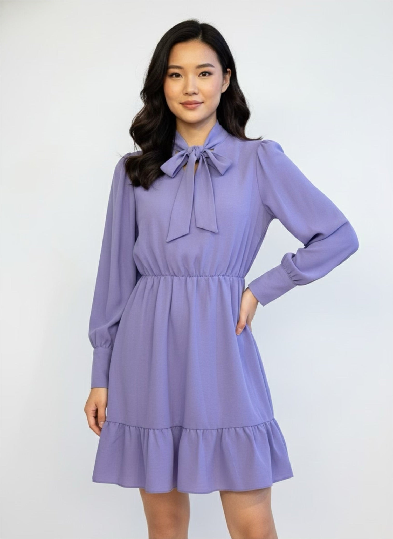 Lilac skater dress with ruffle and knot at the neck