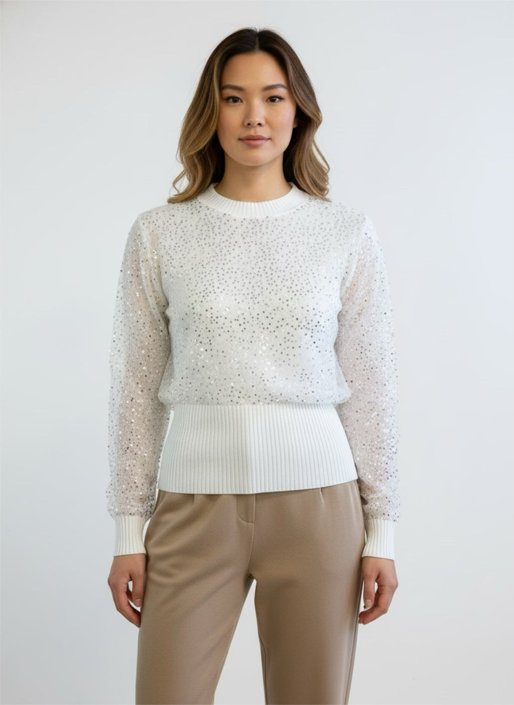 Small ribbed white sweater lined with sequin tulle