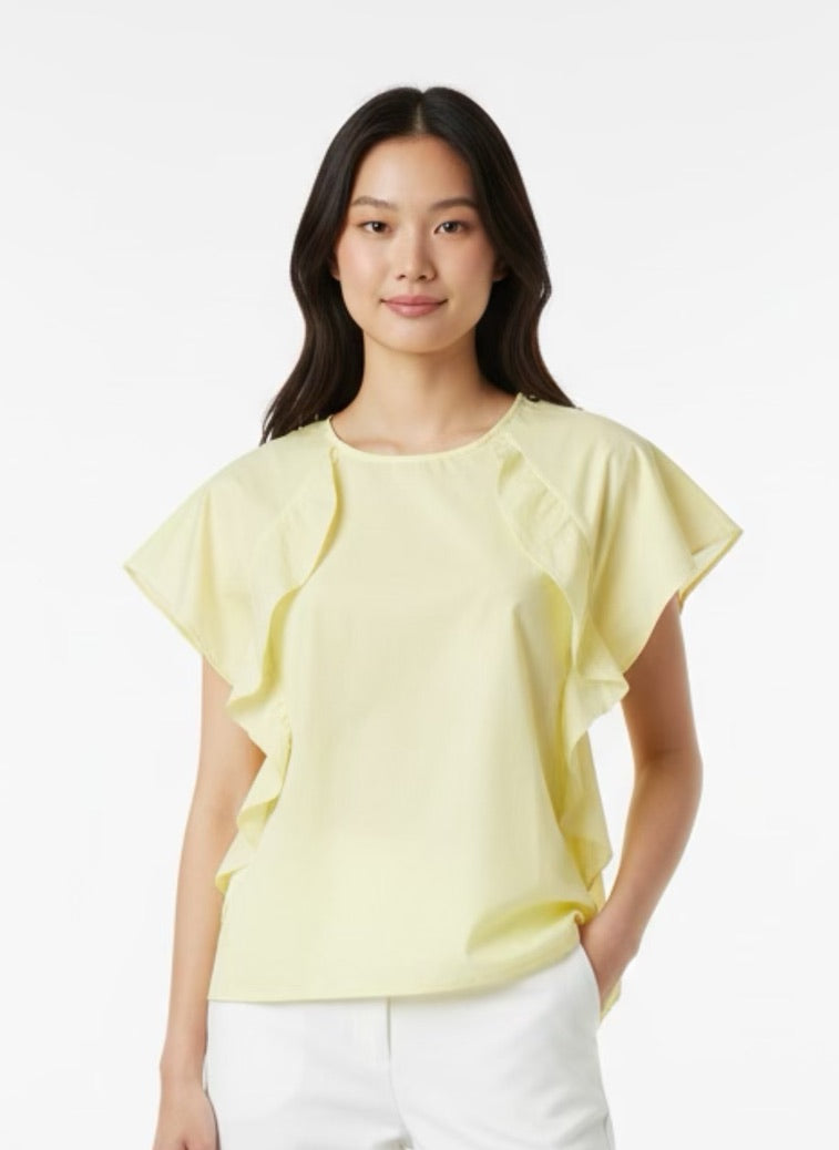 Yellow blouse with ruffle and three buttons on the shoulders