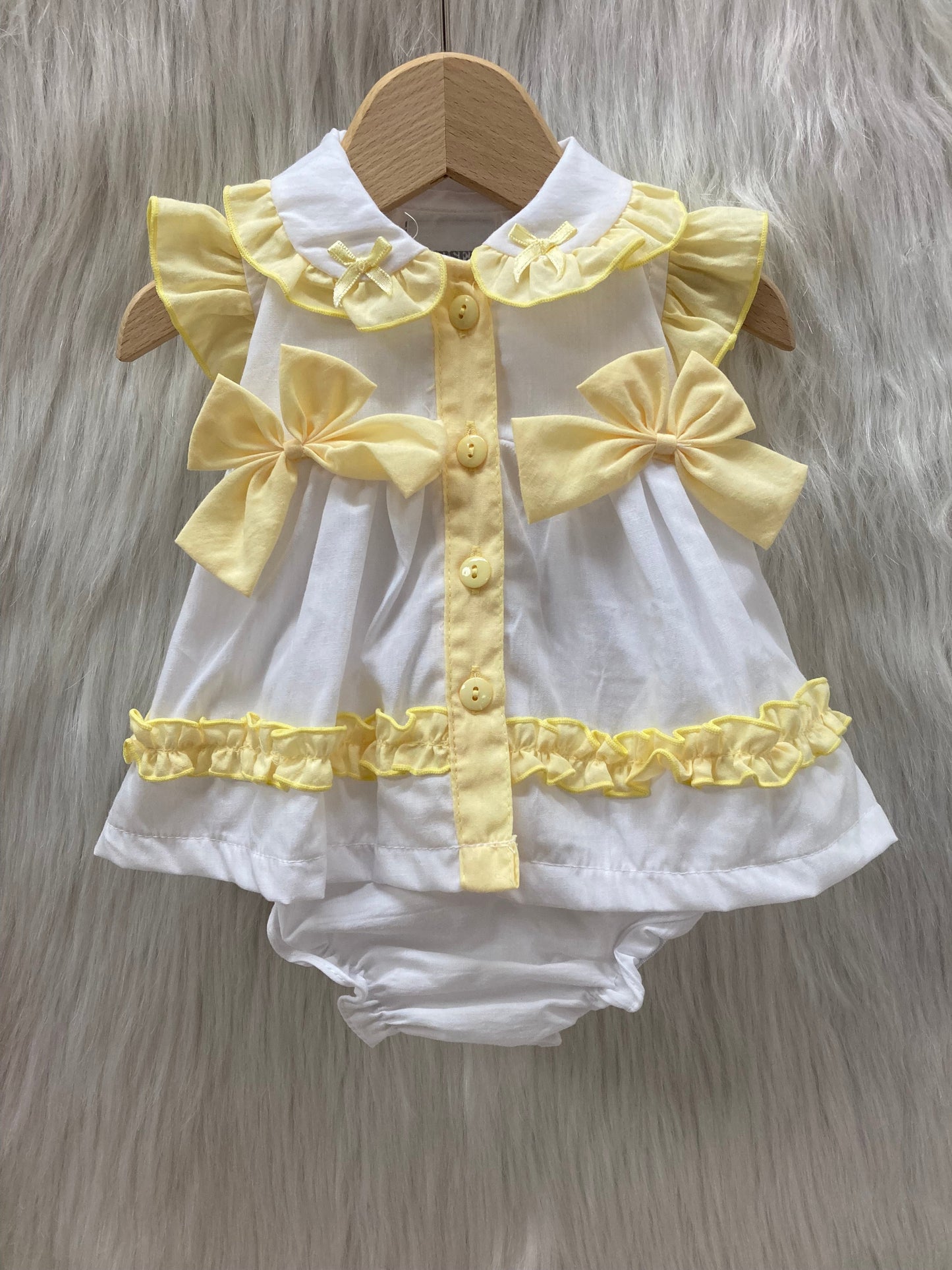 Rock a Bye Baby Meisjesjurk Wit/Geel met Strikjes