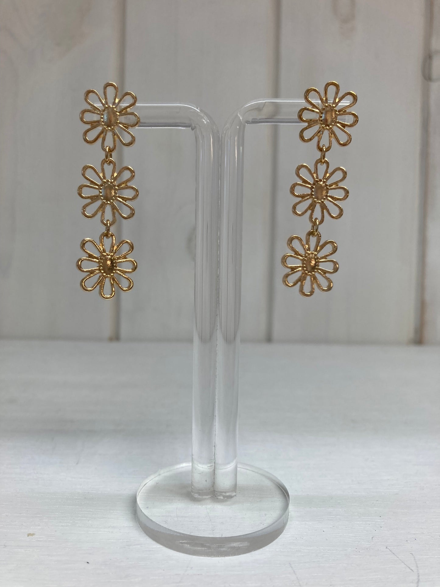 Golden Blossom Oorhangers – Drie Bloemen Luxe Goud