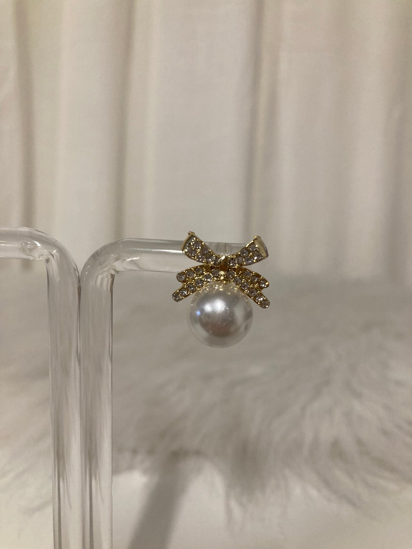 Pearl Bow Elegance Oorbellen – Gouden Strik met Parel