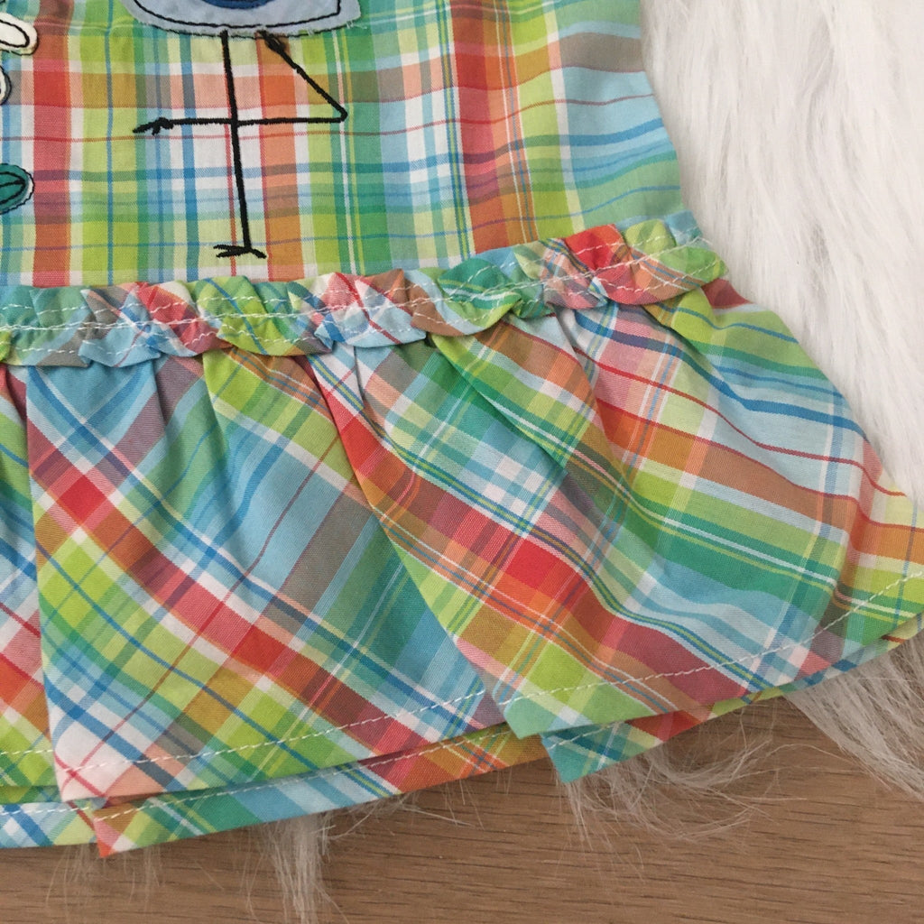 Gekleurd jurkje met pampeerbroekje flamingo