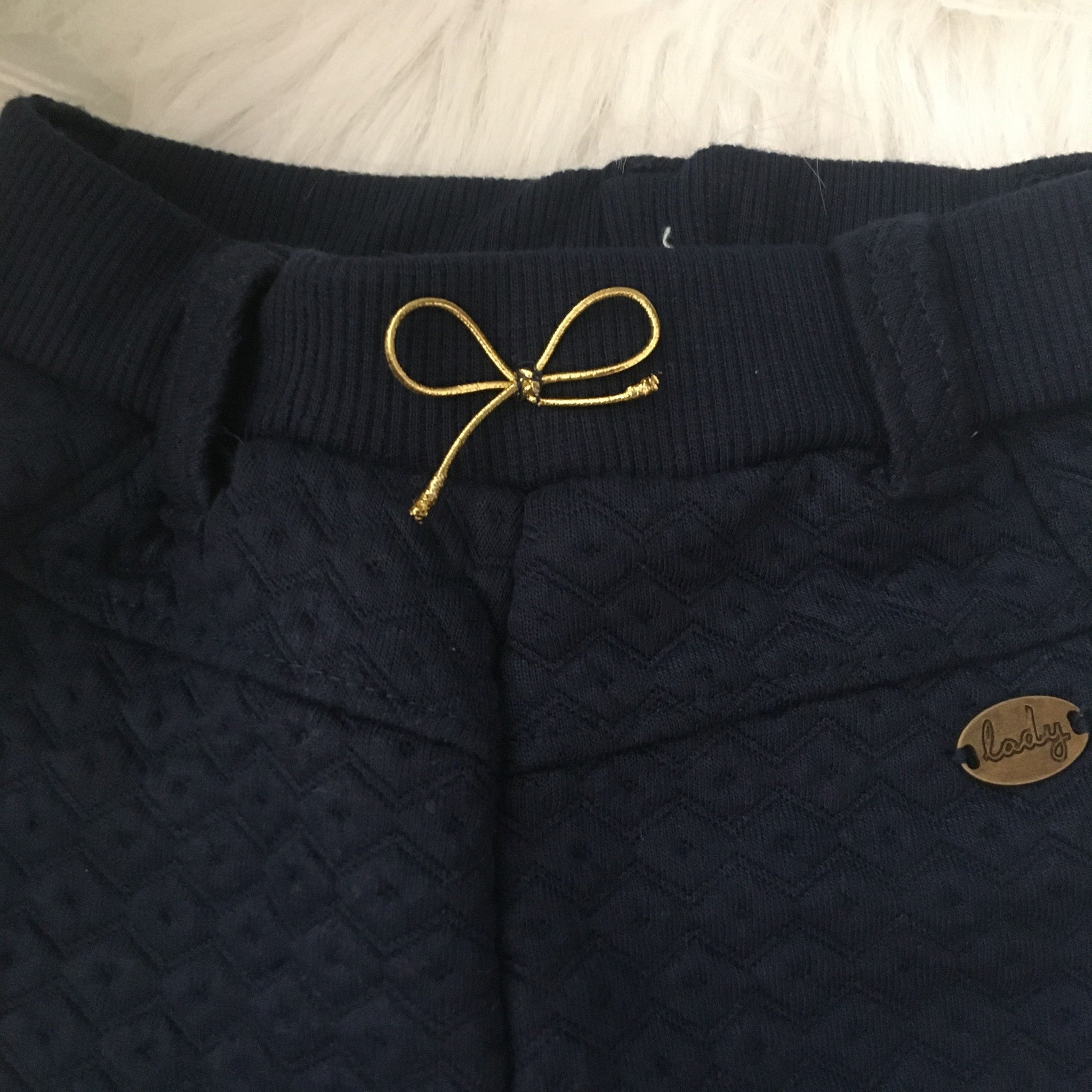 Babybroekje gouden details