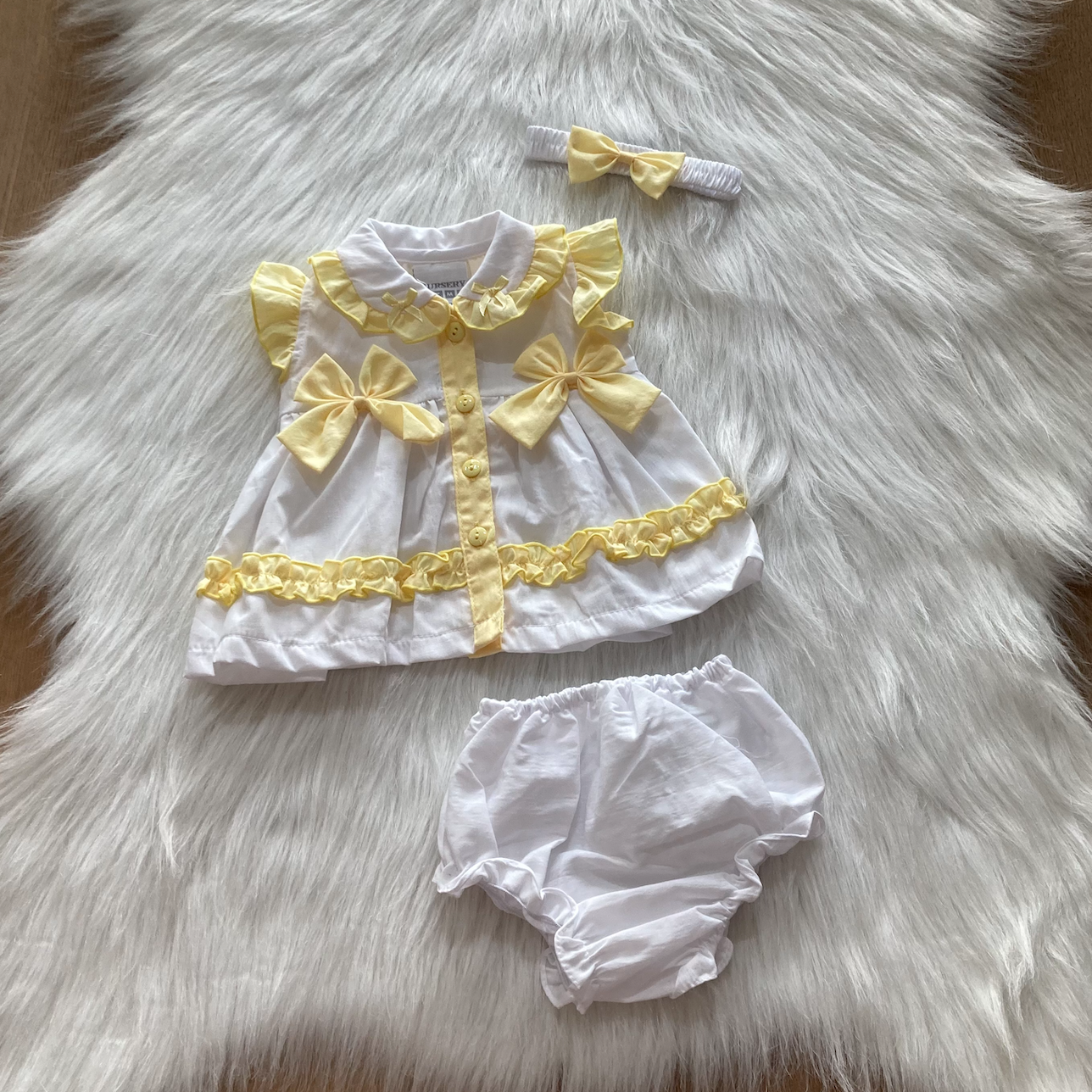 Rock a Bye Baby Meisjesjurk Wit/Geel met Strikjes
