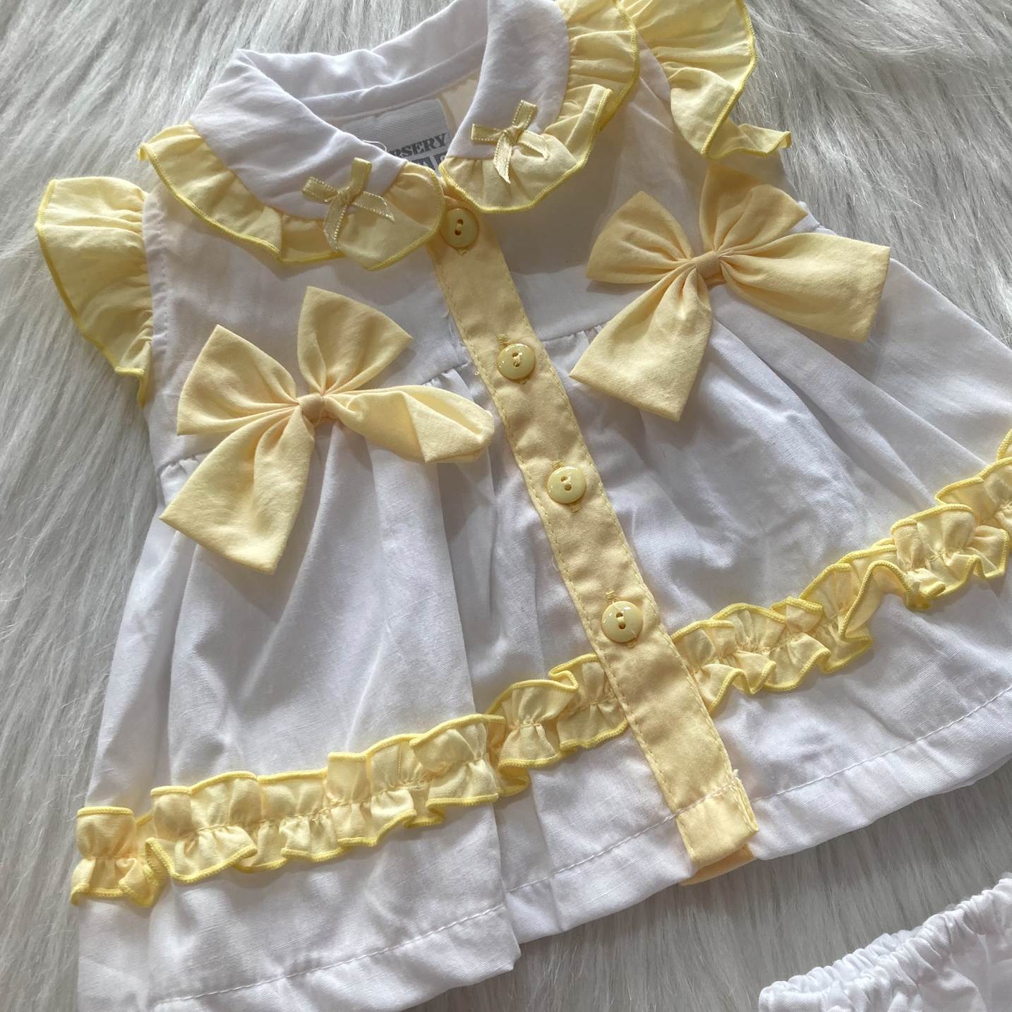 Rock a Bye Baby Meisjesjurk Wit/Geel met Strikjes